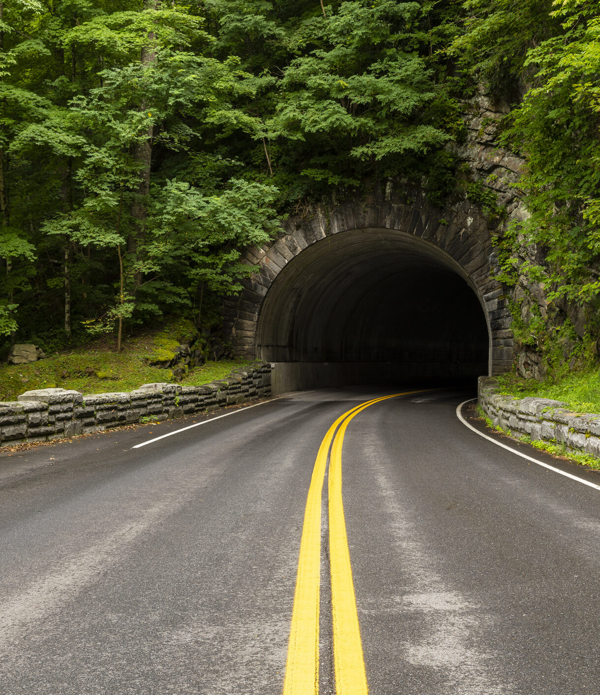 East TN History - East Tennessee Vacations A tunnel on a highway in the Smoky Mountains.
