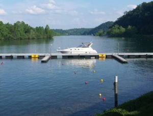 boat moored at dock on beautiful Melton Lake in East Tennessee